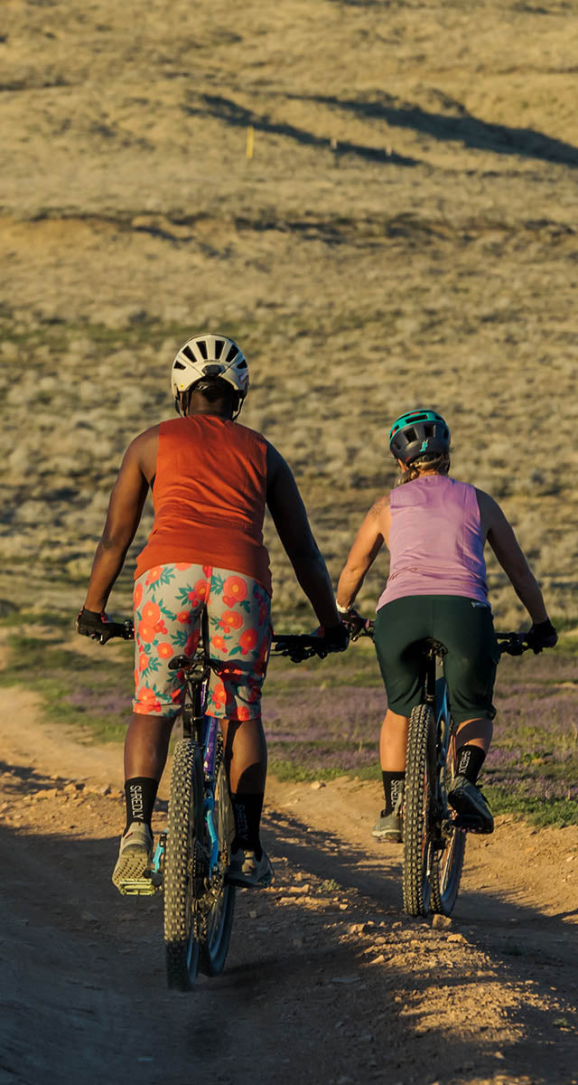 Mobile Version - Two women riding mountain bikes in the Colorado high desert