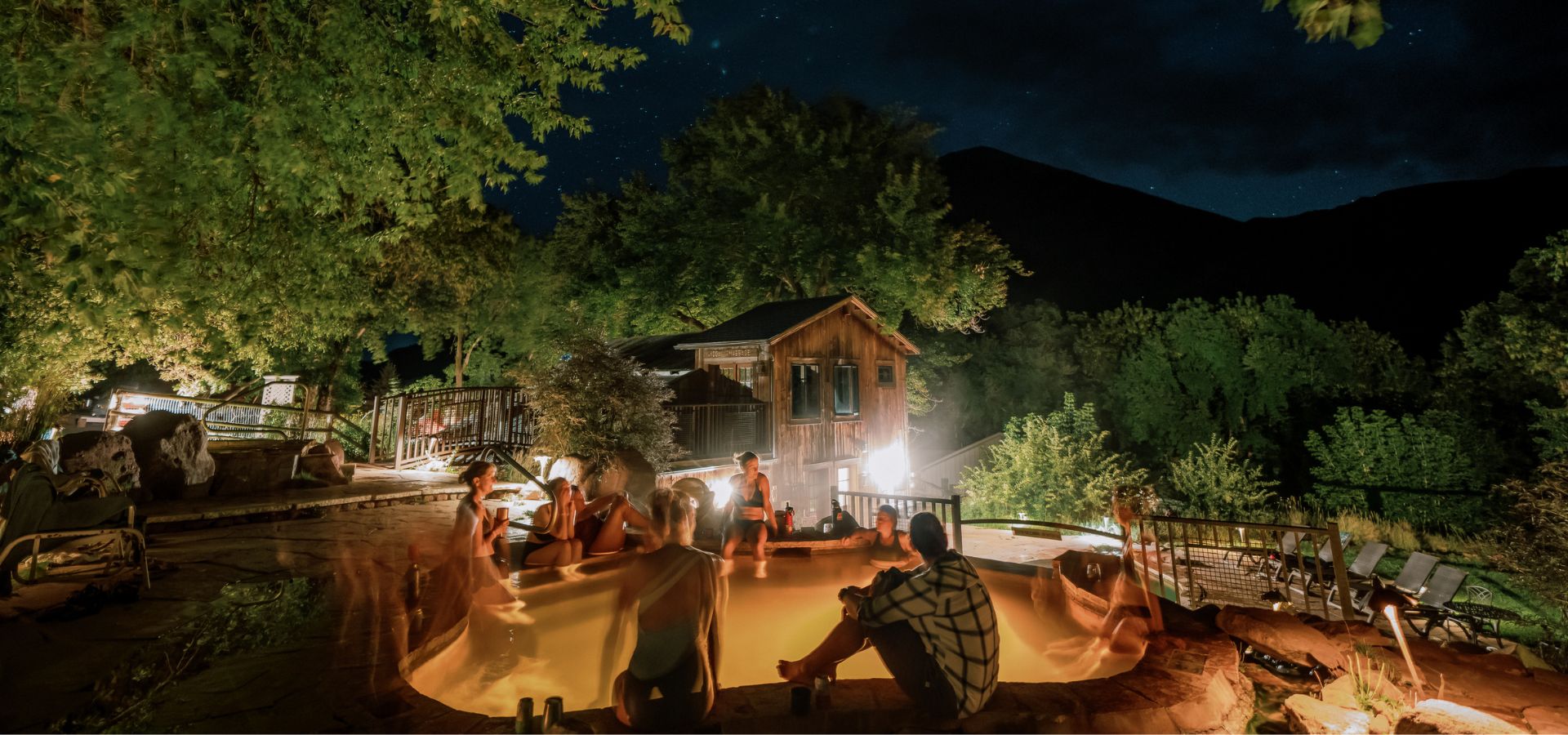 Women sitting in hot springs